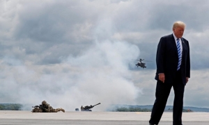 Trump signs defense policy bill with watered-down China measures