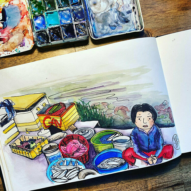 A drawing of a market in a fishing market locating on the outskirts where restaurants in the old town buy raw materials from. To become a fish seller in Vietnam, one needs to have good health, owns white rubber boots, has a superficial but cheerful voice and can stand the fishy smell, artist jokingly said.