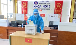 Voters discharge duty at Hanoi's locked down hospitals